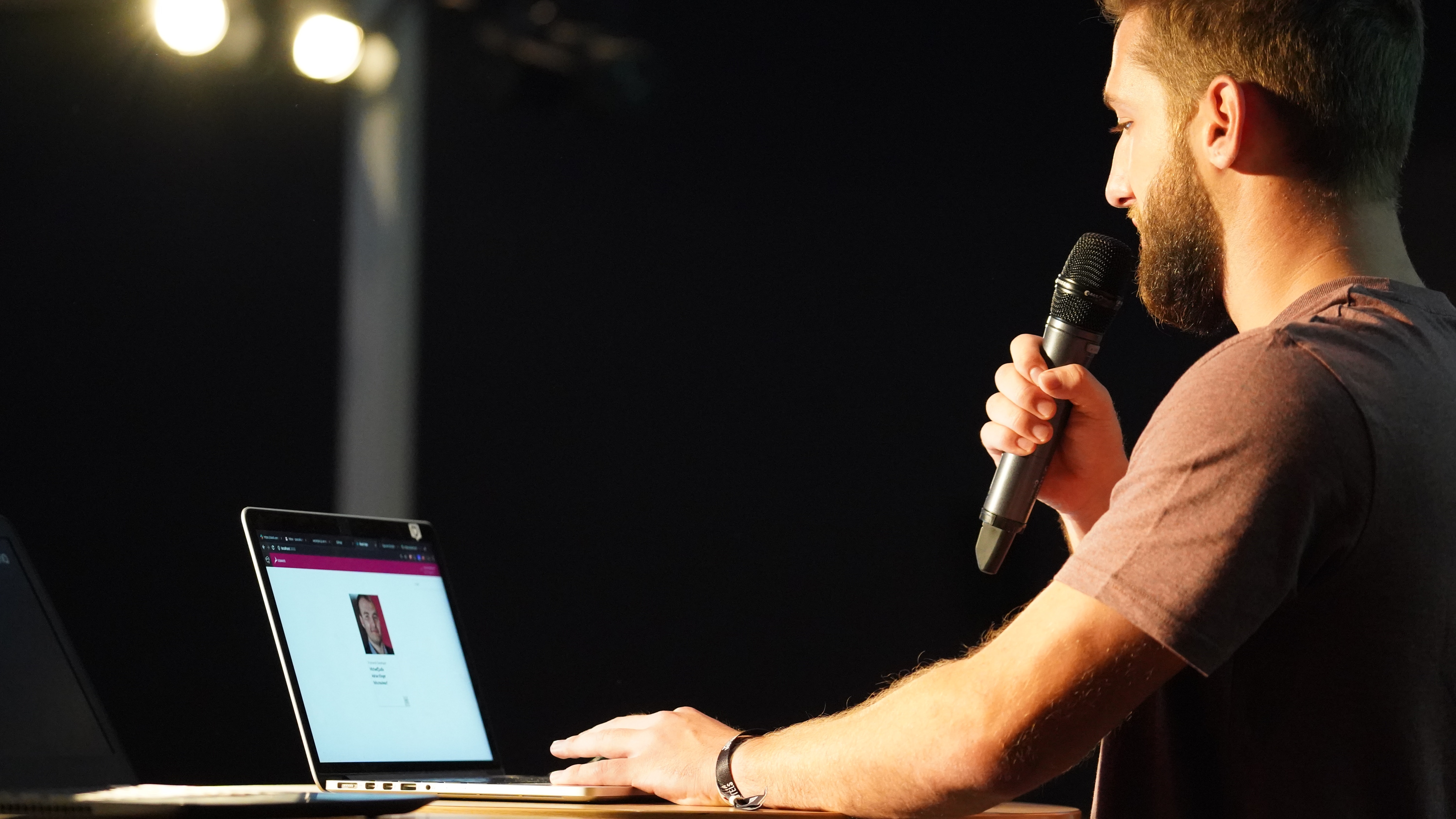 Code Camp 2019 - man presenting at podium with microphone