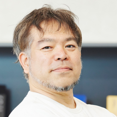 粟津 敏典 氏